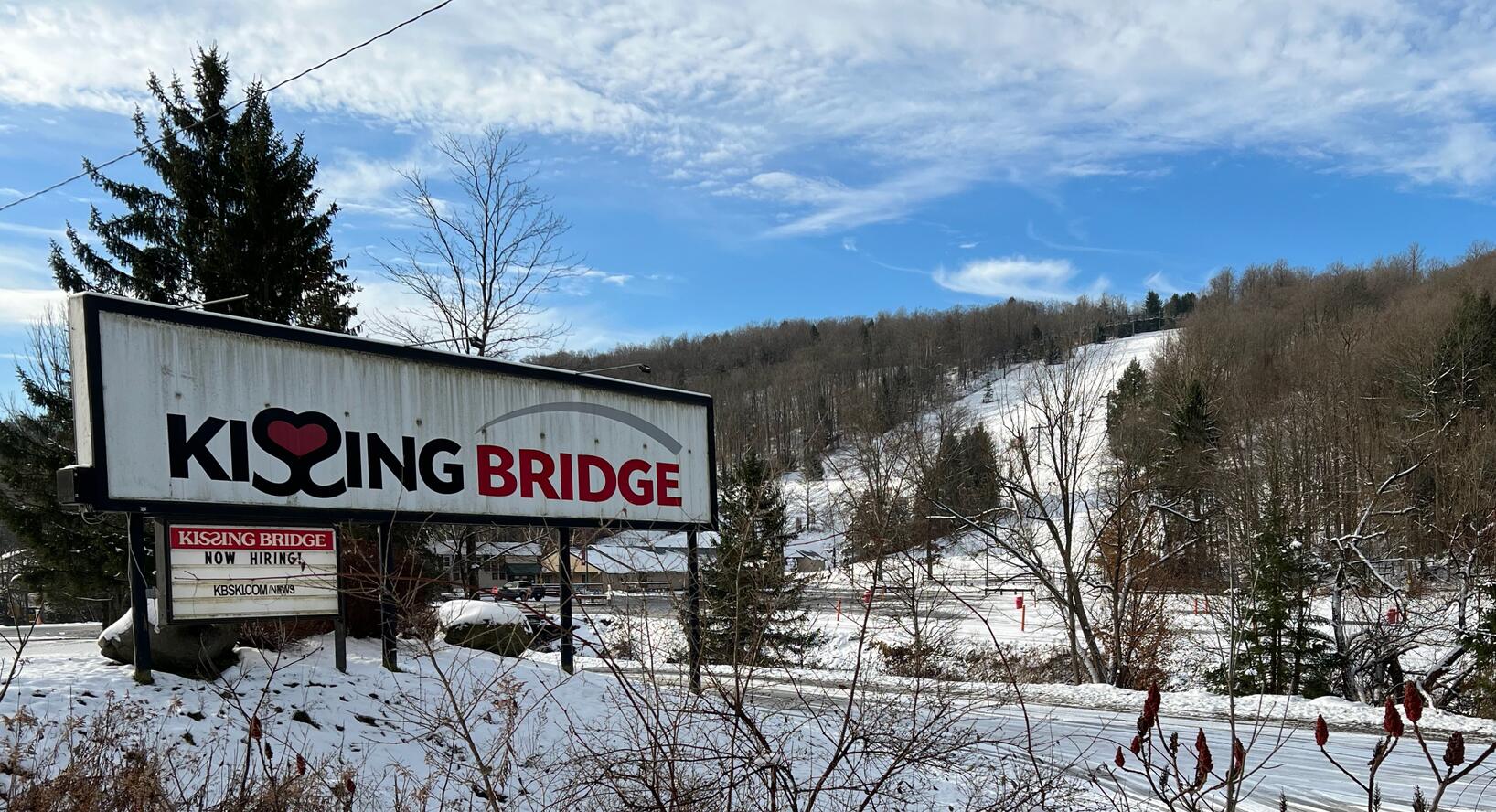 kissing bridge sign and slopes